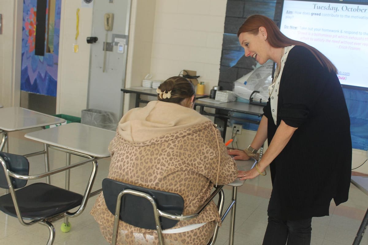 Ms. Mattus helping out a student.