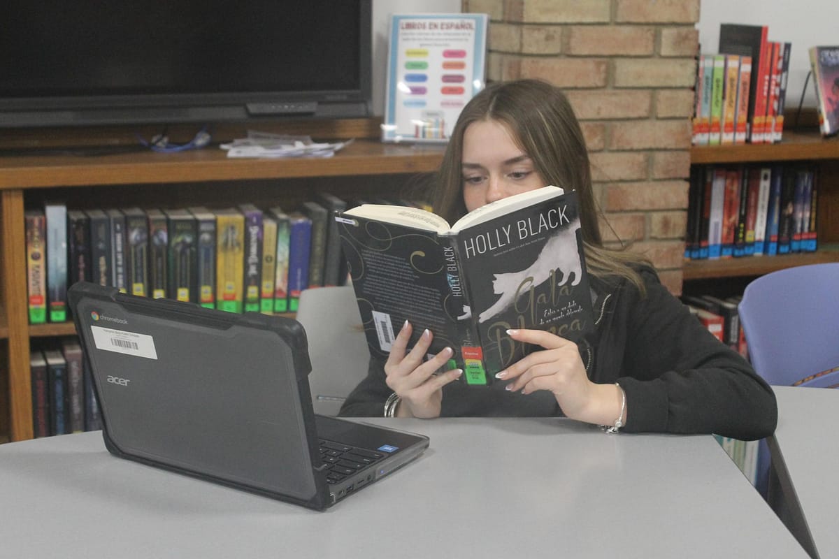Autumn Malave studying for her midterms, hoping for the best.