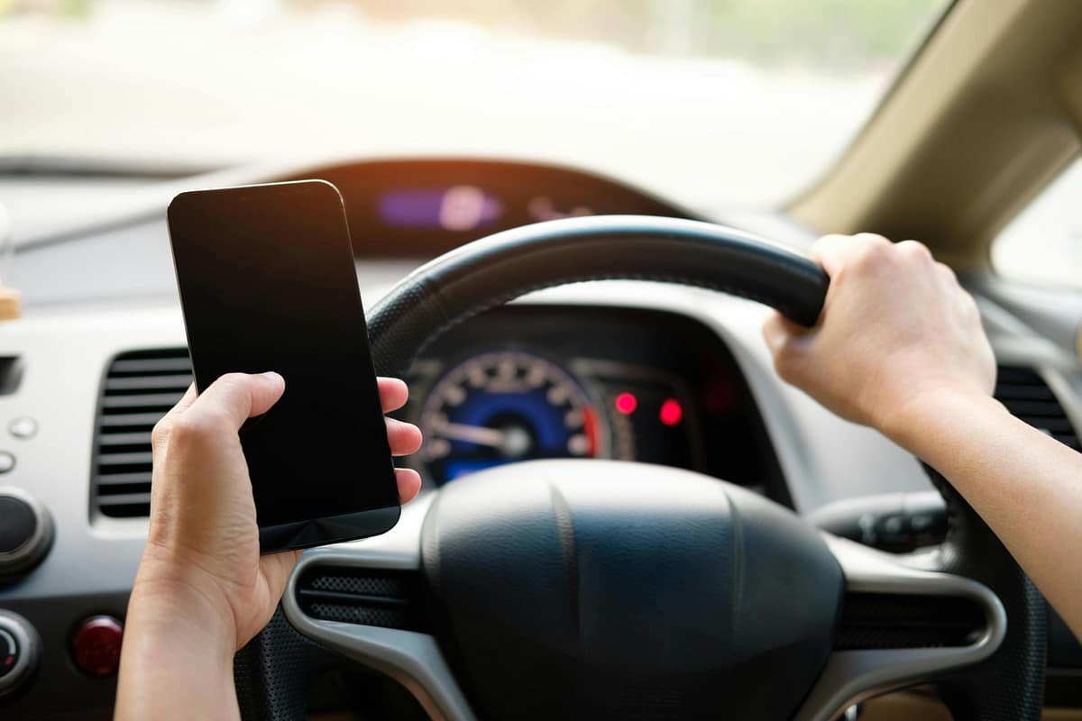 Using a phone while driving will now earn drivers harsher punishments.
Image credit: Acharaporn Kamornboonyarush/Pexels.com
