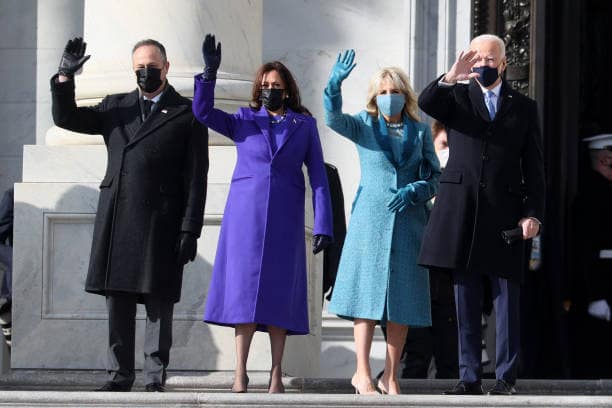 WASHINGTON, DC - JANUARY 20: (L-R) Doug Emhoff, U.S. Vice President-elect Kamala Harris, Jill Biden and President-elect Joe Biden wave as they arrive on the East Front of the U.S. Capitol for the inauguration on January 20, 2021 in Washington, DC. (Photo by Joe Raedle/Getty Images)